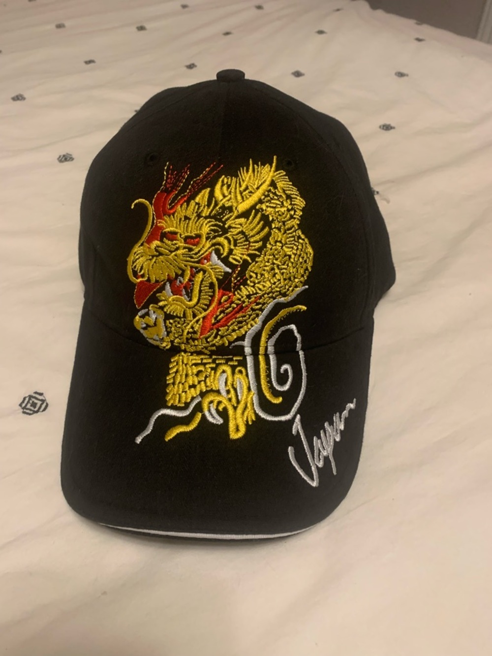 Black Baseball Cap with Embroidered Yellow & Red Dragon